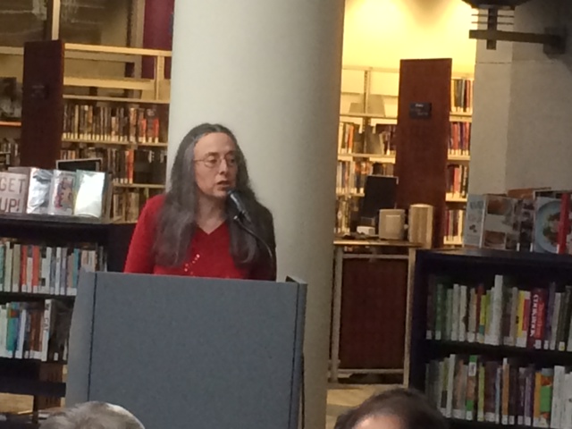 Janet Ruth Heller speaking at the Kalamazoo Public Library; photo by Hedy Habra